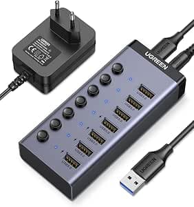 UGREEN USB Hub 7 Port with Independent Switch and 24 W Power Supply (12 V/2 A) USB Hub 3.0 Active for Charging and Data Transfer Aluminium Housing Compatible with MacBook, Surface Pro7 and Other